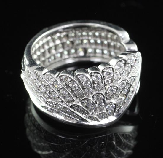 A modern Garrard & Co 18ct white gold and pave set diamond dress ring, size S.